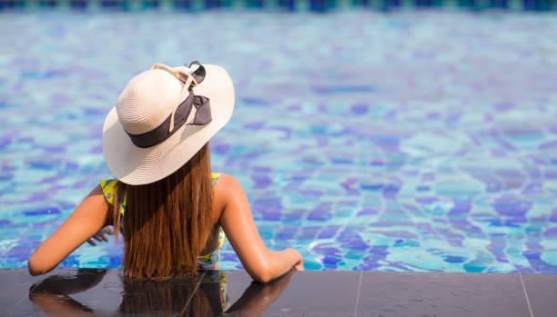 istock Woman Relaxing In The Pool 1205529089