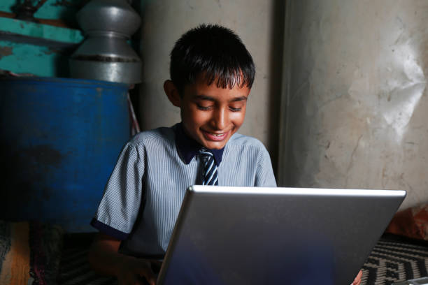 istock Teenager Boy Using Laptop 1205533193