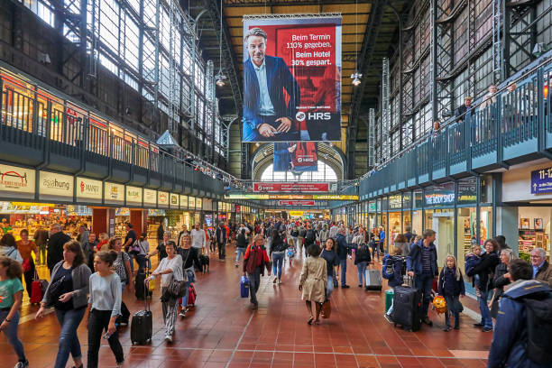 Hamburg, Germany - September 08, 2019: People walk through the lobby of the Hamburg train station.