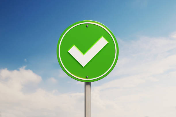 High quality 3d render of a green road sign over blue sky background. Horizontal composition with copy space.