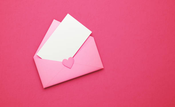 istock Pink Envelope with Heart Shape Seal and Empty Note on Hot Pink Background 1205534655