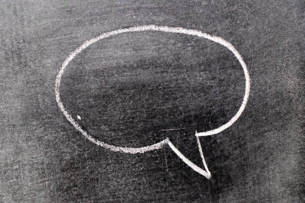 istock White chalk hand drawing in round bubble speech shape with blank space on blackboard background 1205535191