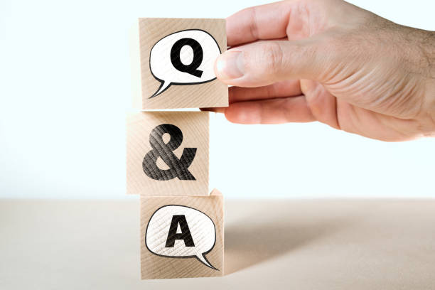 istock Q&A question and answers concept with speech bubbles on wooden blocks 1205537162