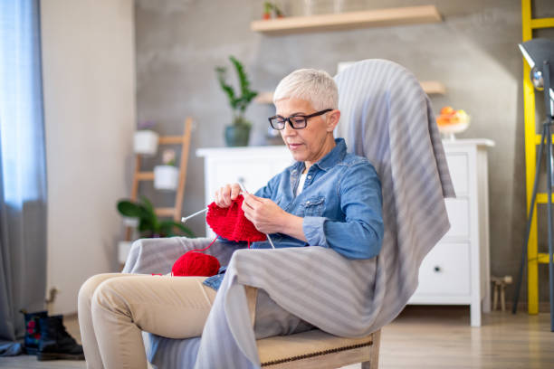 istock Making a warm scarf for the winter 1205538089