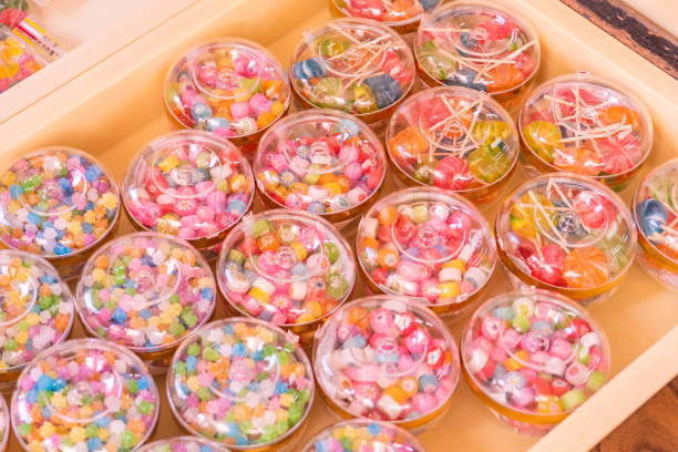 istock Colorful sweet Japanese traditional sugar candy in plastic boxes 1205538102