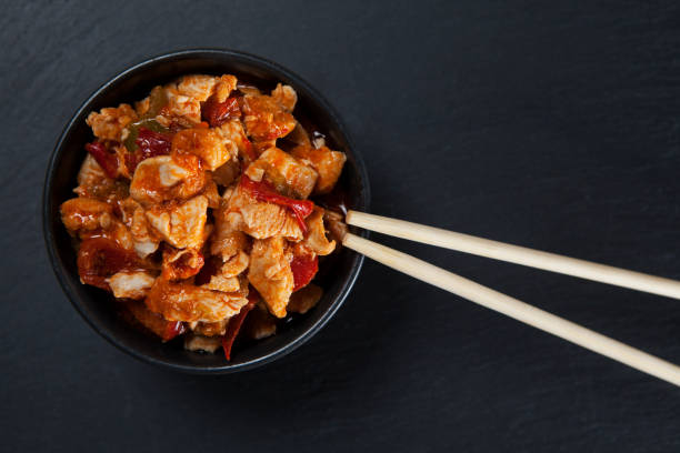 Kung pao chicken. Part of a series of nine Asian food dishes. Traditional chinese street food. Prepared with nuts and Sichuan pepper. Closeup. Top view Kung pao chicken. Part of a series of nine Asian food dishes. Traditional chinese street food. Prepared with nuts and Sichuan pepper. Closeup. Top view. hoisin sauce stock pictures, royalty-free photos & images