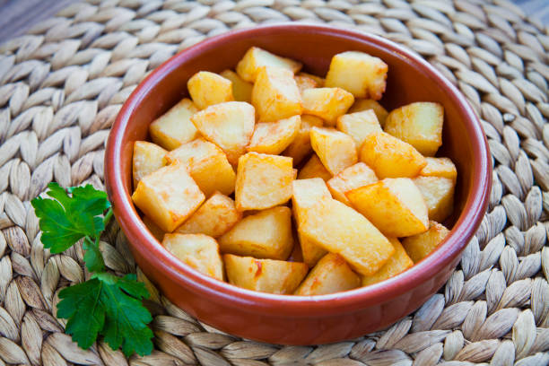 istock Spanish cuisine potato snack - potato bravas. 1205546671