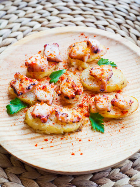 istock Galician octopus with potatoes - Spanish traditional dish from Gallicia - octopus with potatoes. 1205546710