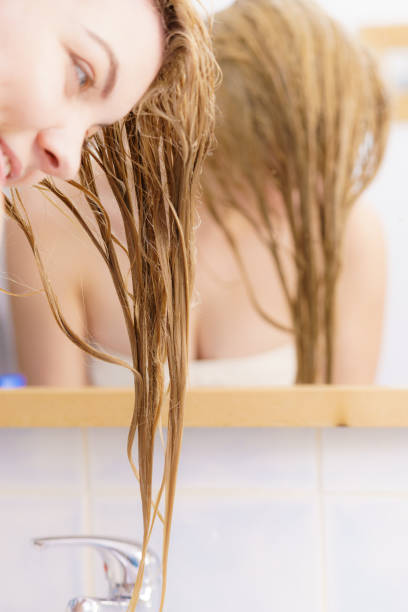 istock Woman having wet blonde hair 1205546711