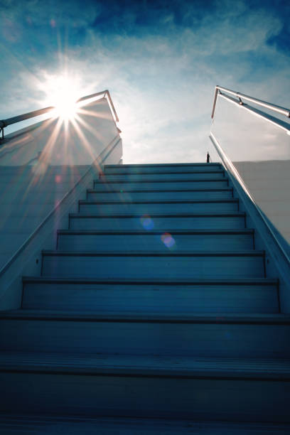 stairs up, ladder to the ship or plane. sky stock photo