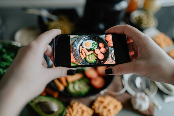 istock Photographing fried eggs with vegetables and fruits 1205551015