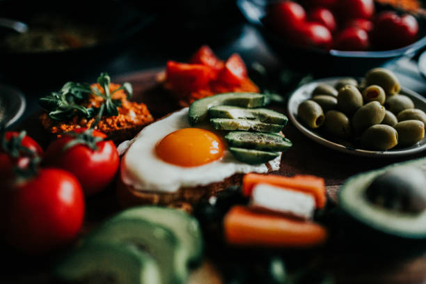 istock Toast with fried egg and avocado and bruscheta appetizers 1205551060