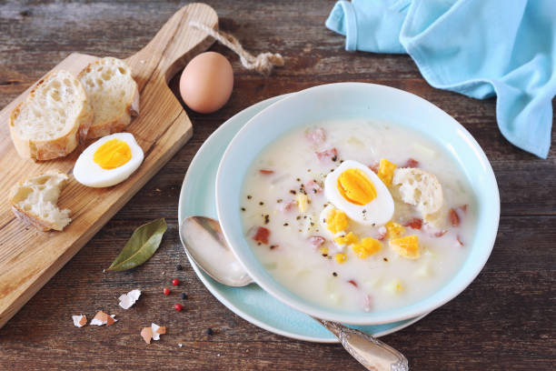 istock Sour soup with sausage,  potatoes and eggs 1205551926