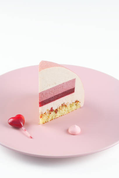 contemporary ruby chocolate dome mousse cake - raspberry heart shape gelatin dessert valentines day imagens e fotografias de stock