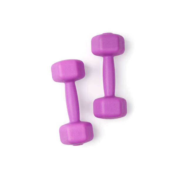 istock purple plastic dumbbell for sports isolated on white background 1205552609