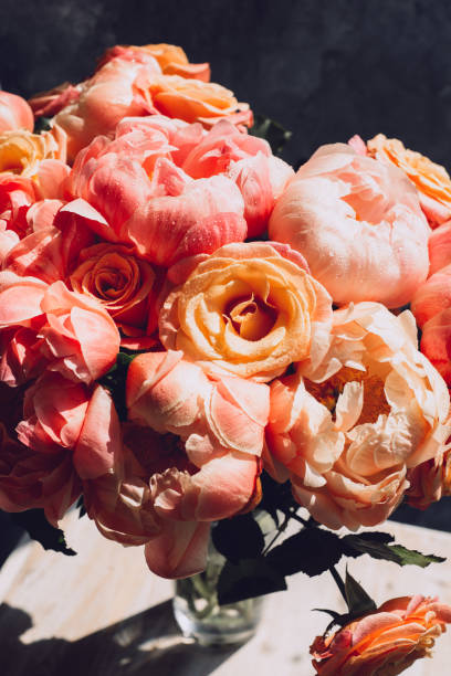 istock Fresh bunch of pink peonies and roses 1205555512