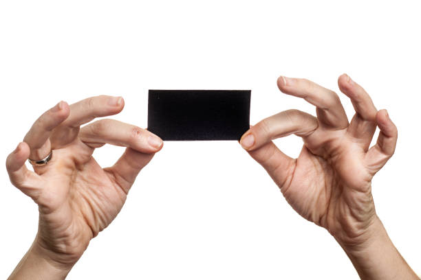 istock blank card in woman hand 1205555776