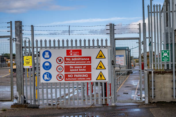 istock Industrial yard fenced off to restrict unauthorised access 1205556571