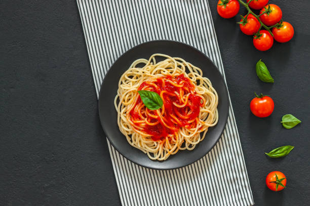 istock ?lassic italian spaghetti pasta with tomato sauce 1205559341