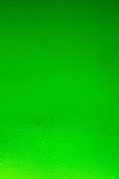 istock Texture water drops on the bottle of beer. Drops background. 1205561083