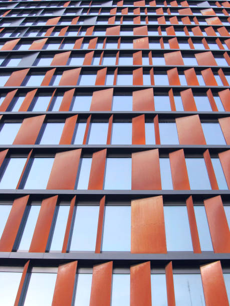 istock Modern building with equal windows standing in Polish city Lodz. 1205562000