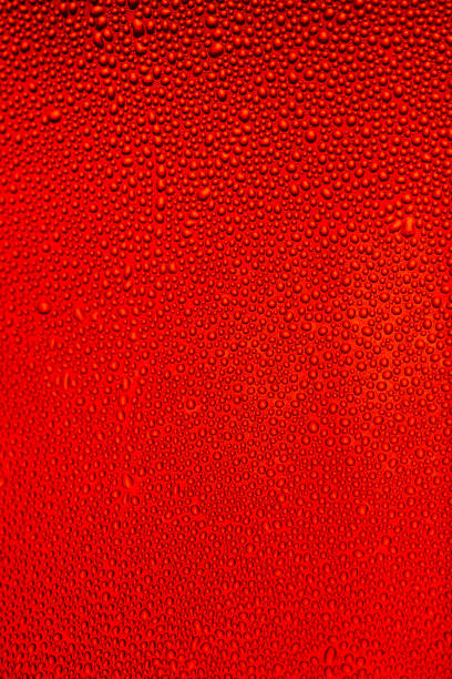 istock Water drops on red background,Macro carbonated water 1205562590