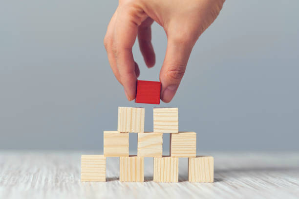 istock One different board game pawn. Individuality, independence, leadership and uniqueness concept. Stand out from the crowd. Think outside the box. Dare to be different. 1205564021