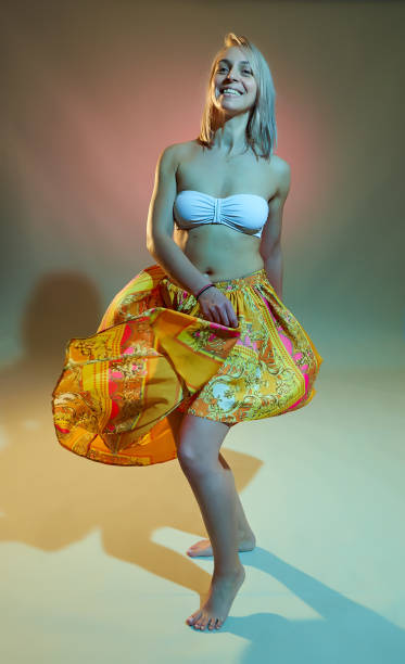 istock Blonde dancer in bellydance outfit 1205564127