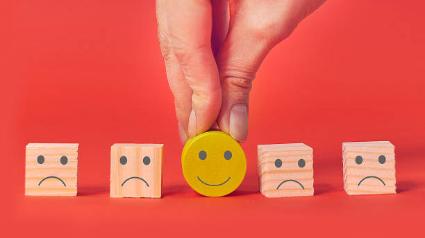 istock Customer showing rating with happy icon, Customer satisfaction survey concept, copy space. 1205564603