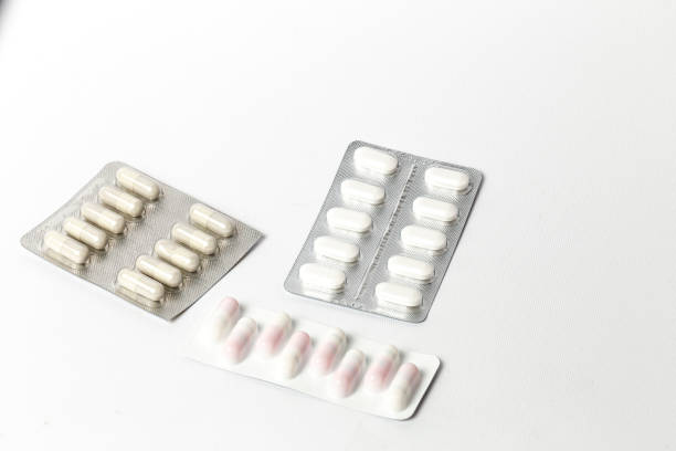 istock Assorted colorful pills and capsules in a Blister packaging 1205565990