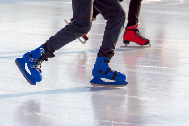istock different people are actively skating on an ice rink 1205566678