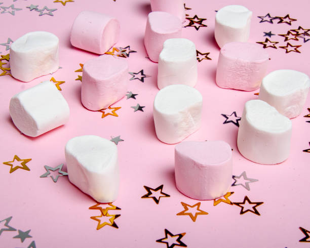 istock Delicious jelly sweets: pink and white marshmallow 1205567187