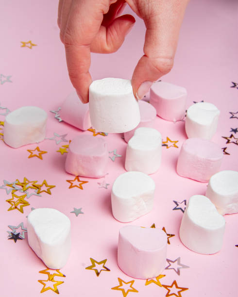 istock Delicious jelly sweets: pink and white marshmallow 1205567201