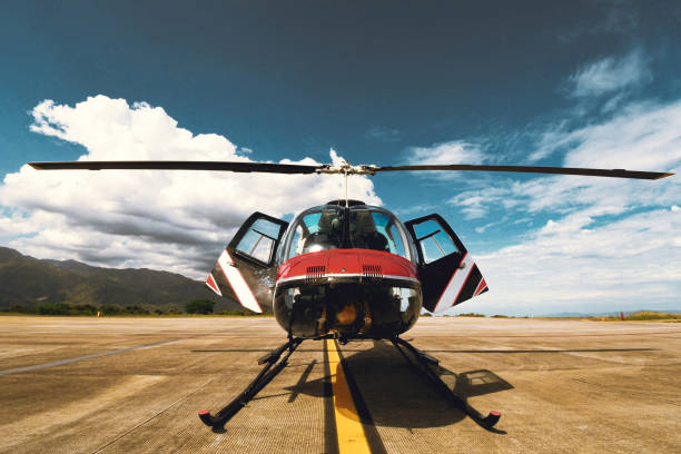 istock Small airport with control tower and helicopter 1205567946