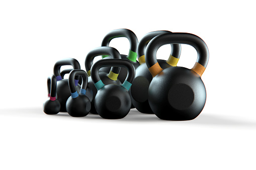 Gym equipment weight kettle bells isolated on white background stock photo