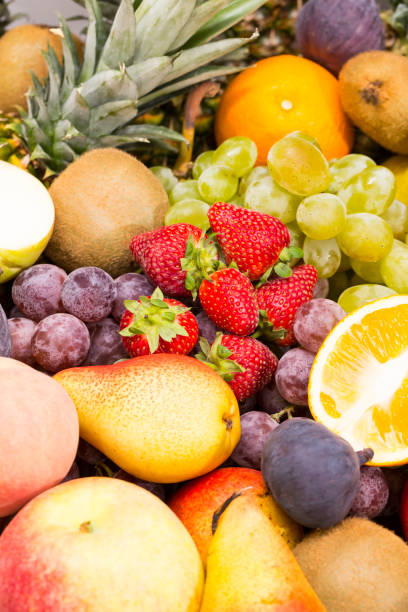 istock fruits background from fresh juicy fruits apples 1205577189