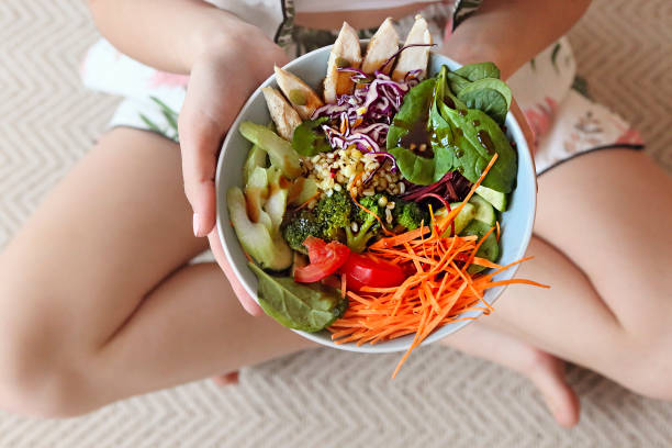 istock Crop woman with power bowl 1205579170