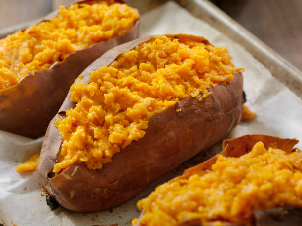 twice baked, stuffed sweet potatoes - vegan food still life horizontal image imagens e fotografias de stock