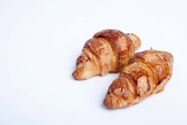 istock coffee and croissant on the table 1205582953