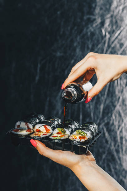 istock Delicious sushi with soy sauce 1205583425