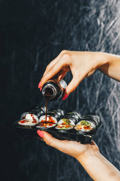 istock Delicious sushi with soy sauce 1205583452