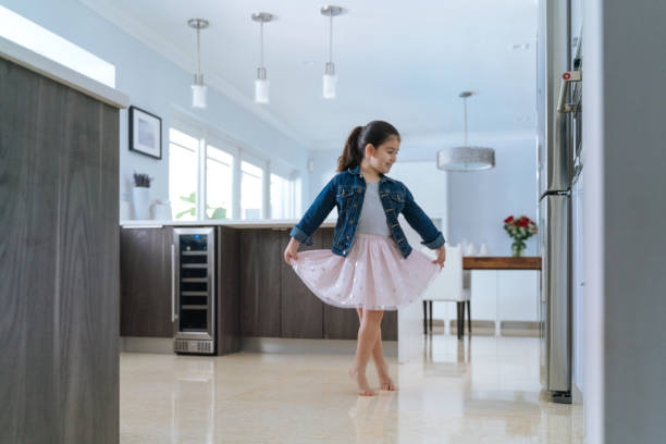 istock Little hispanic ballerina 1205584245