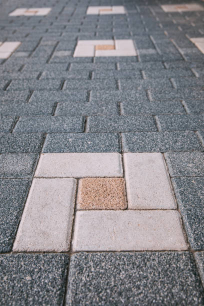 istock Brick stone tiled street pavement road texture background. 1205584637