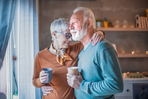istock Beautiful senior couple drinking coffee. 1205584981