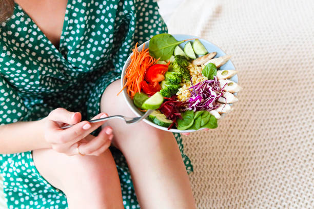 istock Crop woman with power bowl 1205585937