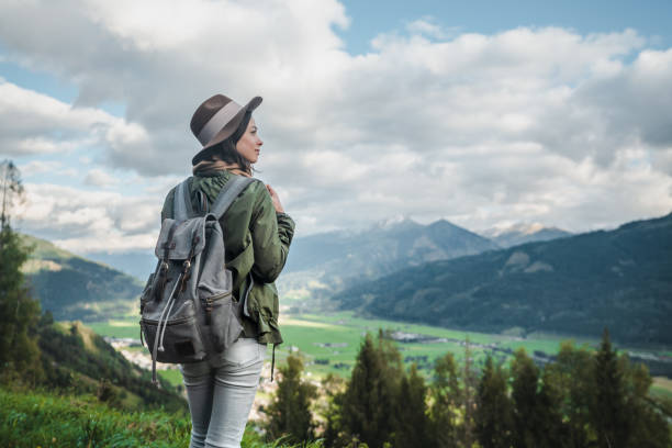 istock Young woman with a backpack in Austria 1205586089