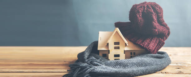 istock house model with hot  on the desk 1205586387