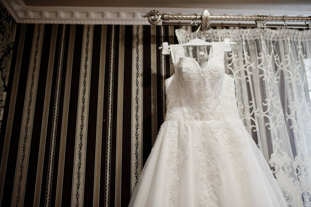 istock Elegant white wedding dress at bride morning. 1205588624