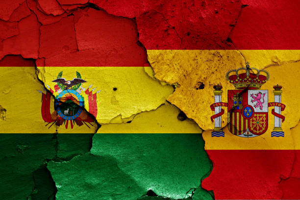 istock flags of Bolivia and Spain painted on cracked wall 1205589952