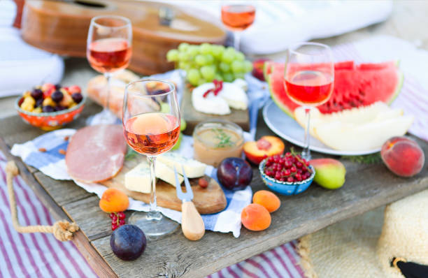 istock Picnic on the beach at sunset in the style of boho 1205590217